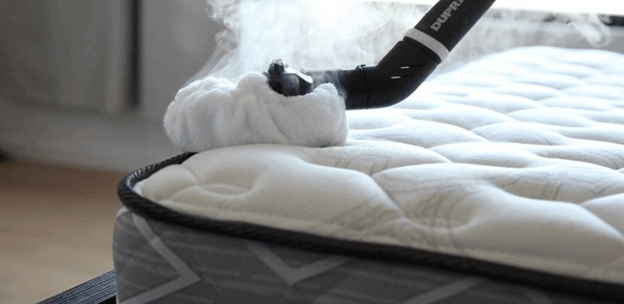 steamer cleaning the mattress